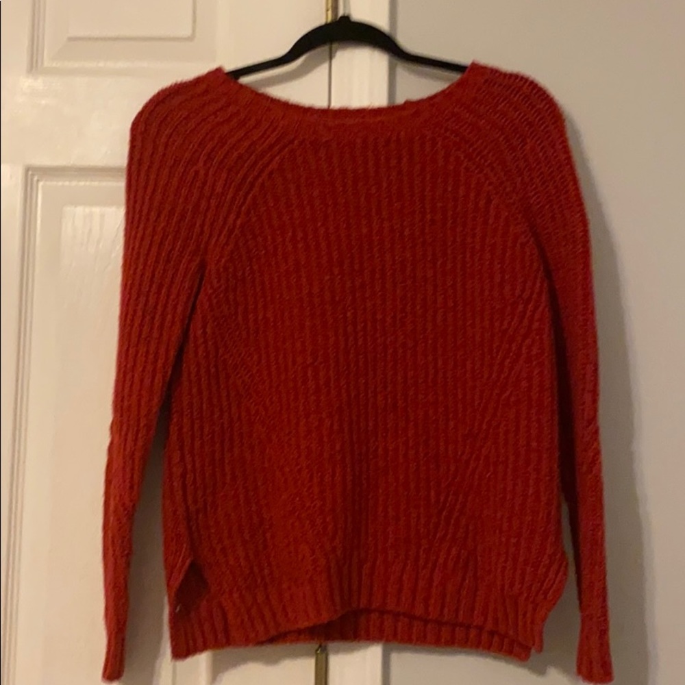 thick red sweater